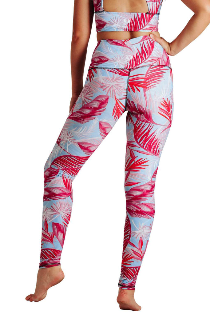 Yoga Democracy Women's Eco-friendly yoga pants leggings in Hot Tropic Flamingo pink and baby blue print. USA made from post-consumer recycled plastic bottles. Sweat wicking, anti-microbial, and quick dry ultra-soft brushed fabric.