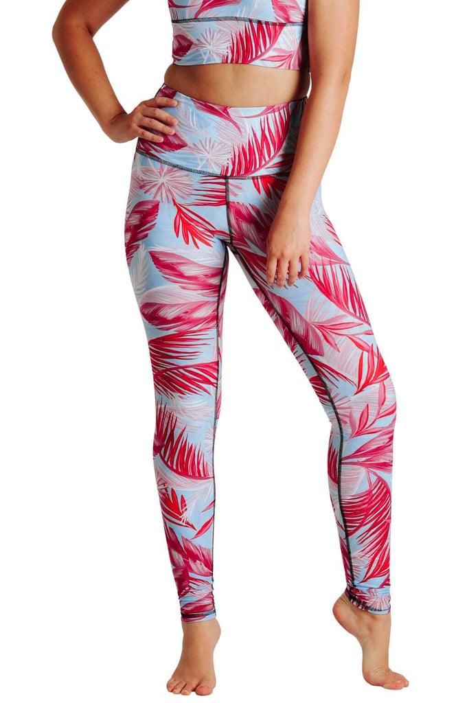 Yoga Democracy Women's Eco-friendly yoga pants leggings in Hot Tropic Flamingo pink and baby blue print. USA made from post-consumer recycled plastic bottles. Sweat wicking, anti-microbial, and quick dry ultra-soft brushed fabric.
