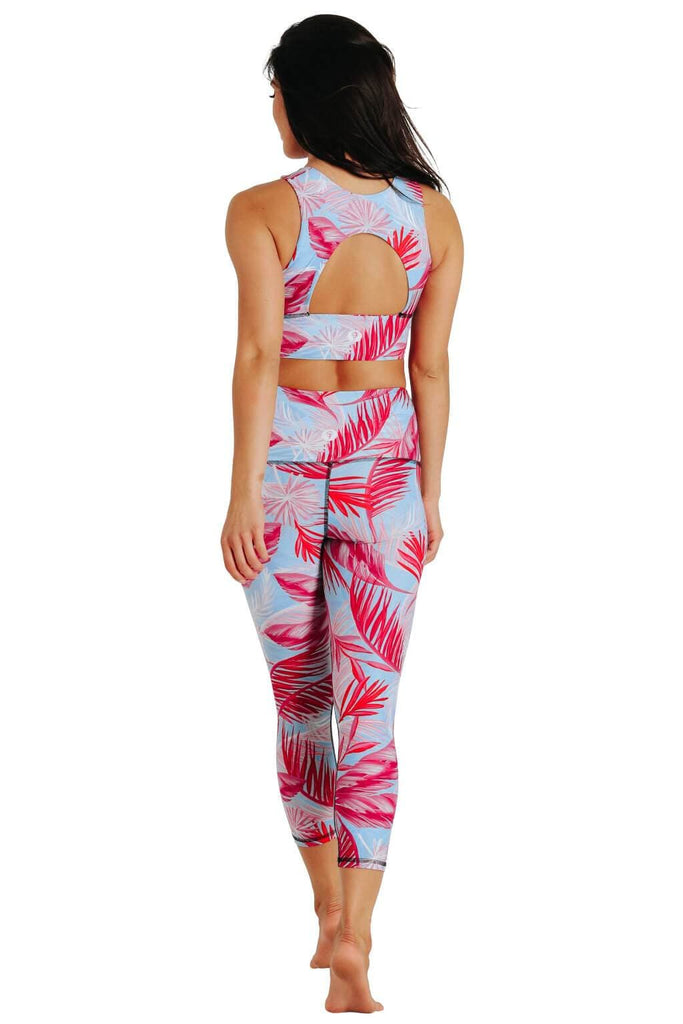 Yoga Democracy Women's Eco-friendly yoga capris crop leggings in Hot Tropic flamingo pink and blue print. USA made from post-consumer recycled plastic bottles. Sweat wicking, anti-microbial, and quick dry ultra-soft brushed fabric.