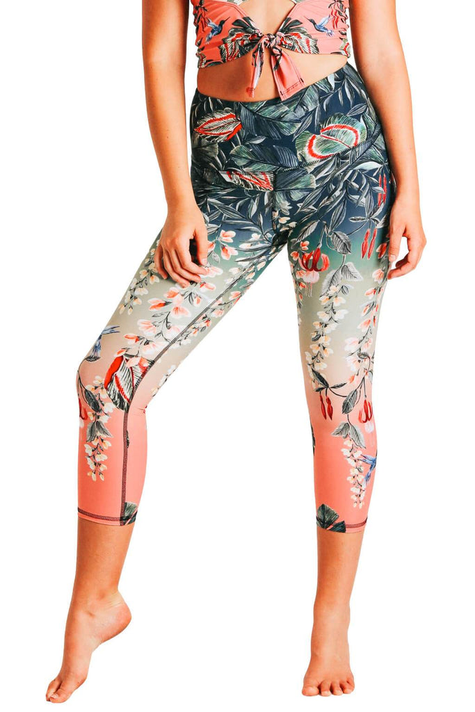 Yoga Democracy Women's Eco-friendly yoga capris crop leggings in Feeling Ferntastic green and pink fern floral print. USA made from post-consumer recycled plastic bottles. Sweat wicking, anti-microbial, and quick dry ultra-soft brushed fabric.