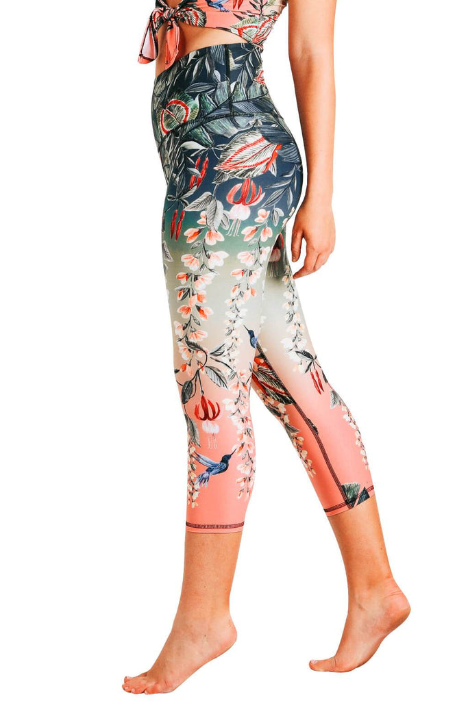 Yoga Democracy Women's Eco-friendly yoga capris crop leggings in Feeling Ferntastic green and pink fern floral print. USA made from post-consumer recycled plastic bottles. Sweat wicking, anti-microbial, and quick dry ultra-soft brushed fabric.