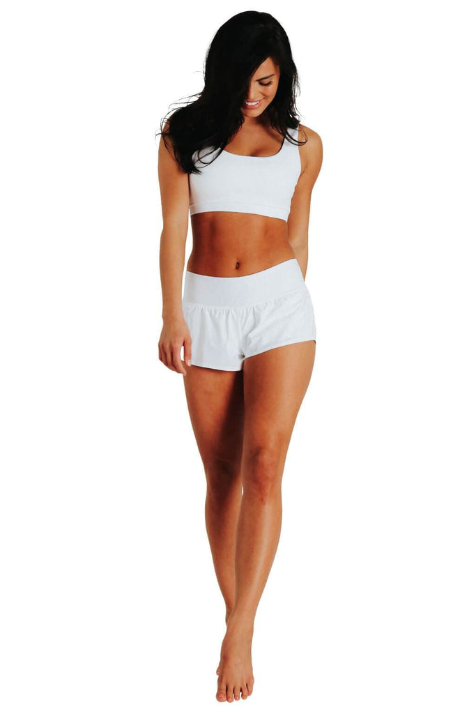 Yoga Democracy women's Eco-friendly activewear Flow Shorts in White color made from post consumer recycled plastic bottles with 3 inch inseam and built-in panty liner. Great running, jogging workout shorts.