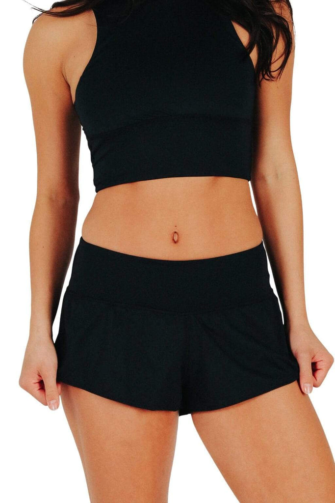 Yoga Democracy women's Eco-friendly activewear Flow Shorts in black color made from post consumer recycled plastic bottles with 3 inch inseam and built-in panty liner. Great running, jogging workout shorts.