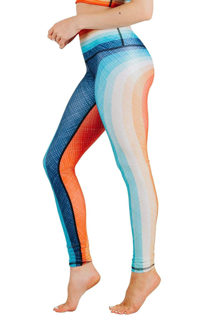 Yoga Democracy Women's Eco-friendly yoga full length leggings in retro rainbow stripes print. USA made from post-consumer recycled plastic bottles. Sweat wicking, anti-microbial, and quick dry ultra-soft brushed fabric.