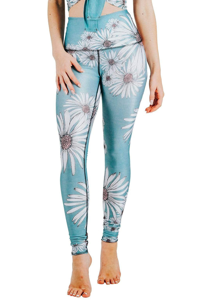 Yoga Democracy Women's Eco-friendly yoga full length leggings in flower child daisy print. USA made from post-consumer recycled plastic bottles. Sweat wicking, anti-microbial, and quick dry ultra-soft brushed fabric.